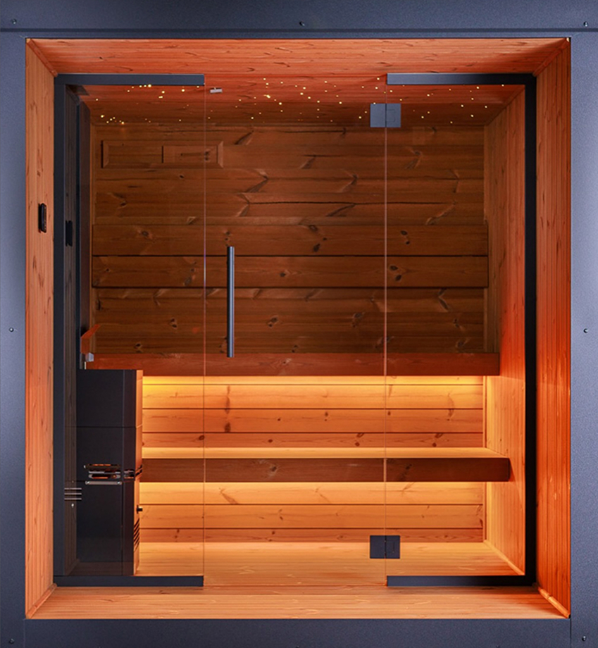Holzsauna mit zwei Sitzbänken, Glasfront und indirekter Beleuchtung unter der oberen Bank. Holzsauna mit zwei Sitzbänken, Glasfront und indirekter Beleuchtung unter der oberen Bank.